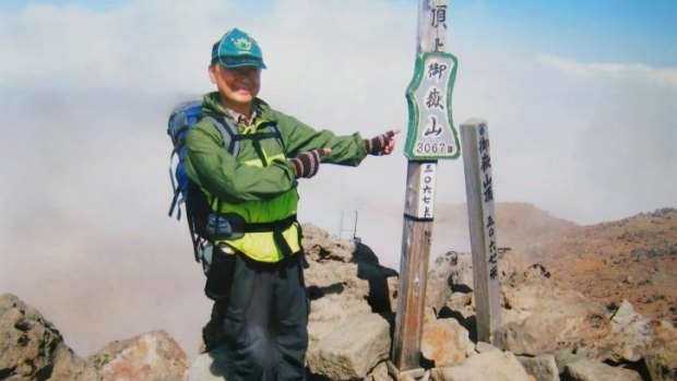 A photo of 59-year-old hiker Izumi Noguchi who fell victim to the eruption of Mount Ontake. This image was taken on the summit before the eruption. Dozens of people were killed after being hit by rocks.