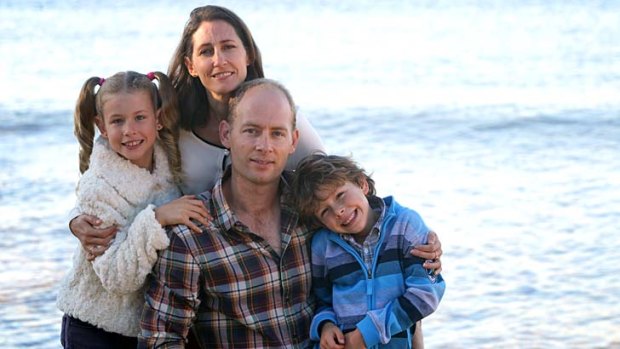 Happier times: Geoff Evans, who has post-traumatic stress disorder, with his wife Lisa and children Emily and Monash.