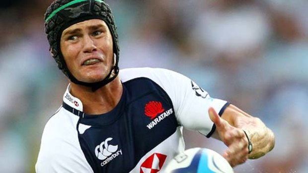 Berrick Barnes of the Waratahs has signed on with the ARU for two more seasons.