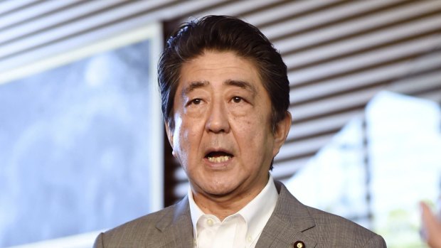 Japans Prime Minister Shinzo Abe answers questions following a possible nuclear test in North Korea.