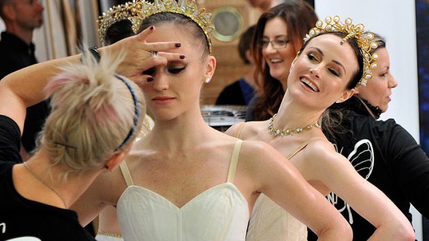 Ballerinas receive finishing touches to their make-up as the 50th anniversary season is revealed.