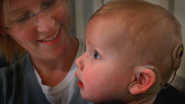 Jessamy Cameron is overjoyed at the changes in 10-month-old son Gabe, diagnosed as deaf after birth, since he had two cochlear implants turned on.