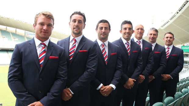 Rooster boosters: Former and current Roosters captains Jake Friend, Mitchell Pearce, Anthony Minichiello, Braith Anasta, Craig Fitzgibbon, Luke Ricketson and Brad Fittler at Allianz Stadium.