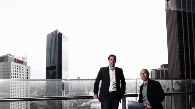 Bain Capital Asia boss Craig Boyce, left, and MYOB chief Tim Reed kicked off the accounting software provider's official roadshow on Tuesday looking to raise more than $830 million for 40 per cent of the company. 
