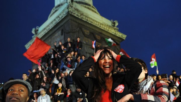 French Socialist supporters celebrate.