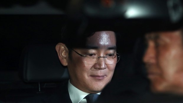 Jay Y. Lee pictured at the time of his arrest in Seoul on February 16.