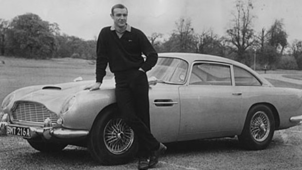 Sean Connery with an Aston Martin used in the film Goldfinger.