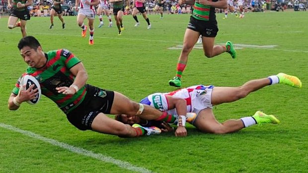 Rabbit romp: Kirisome Auva'a scores one of his two tries. 