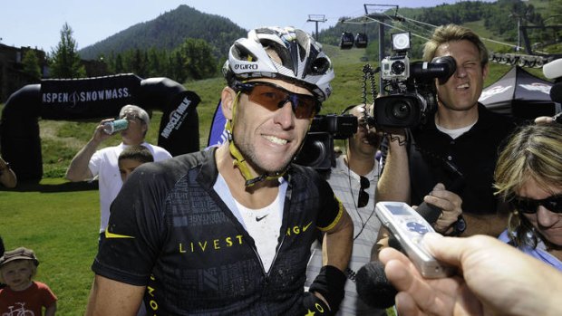 Back on the bike ... Lance Armstrong finishes the Power of Four Mountain Bike Race on Saturday.