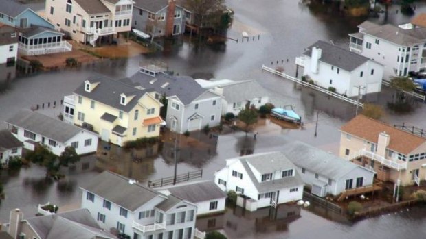 Extreme events such as superstorm Sandy mask background sea-levels rises in US.