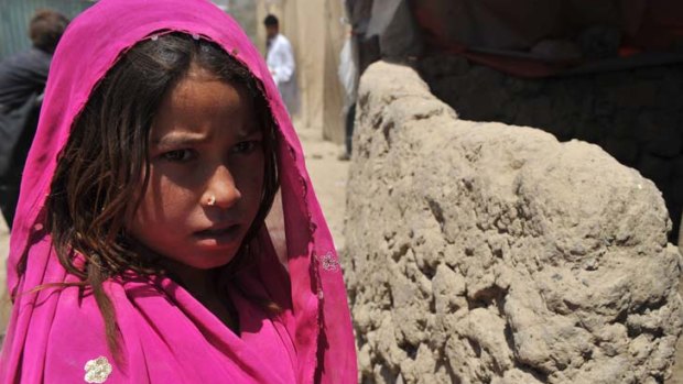 Uncertain future: An Afghan girl in a refugee camp on the outskirts of Kabul.