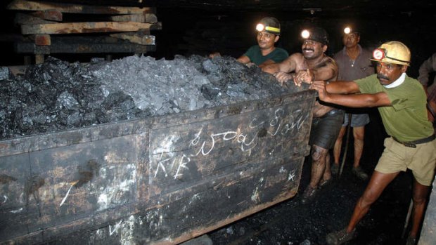 Indian workers in a coal mine at Godavarikhani, 250 kilometres east of Hyderabad.