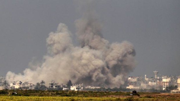 Smoke rises from the coastal side of the Gaza Strip following an Israeli controlled explosion of a tunnel.