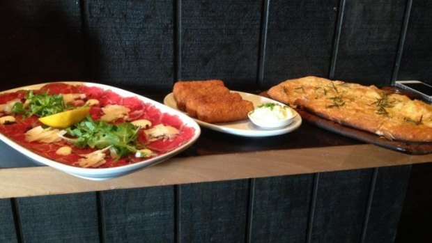 Beef carpaccio, salmon croquettes and pizza bianca are some of the fancy appetisers on offer at The Boulevard.