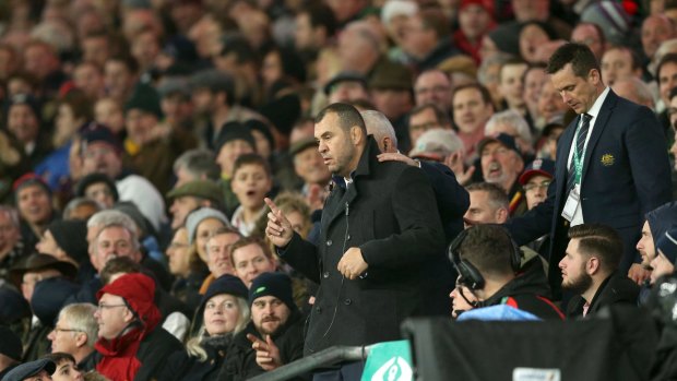 Michael Chieka argues with a fan after leaving the coaching box at Twickenham.