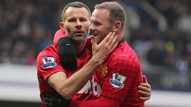 Ryan Giggs celebrates with Wayne Rooney.