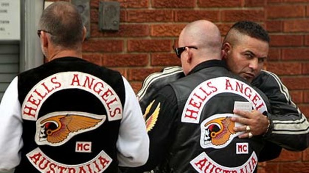 Brothers in arms . . . Hells Angels and associates gather for the funeral of Anthony Zervas at Roselands yesterday.