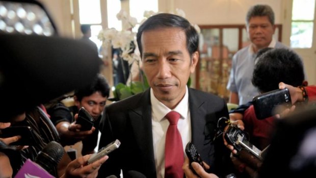 Back to work: President-elect Joko Widodo went back to his day job as Jakarta's Governor on Wednesday. He is due to be sworn in as Indonesia's seventh president on October 20.