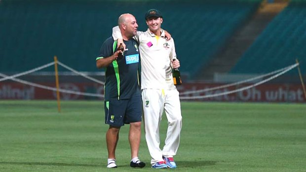 Midnight at the SCG: Darren Lehmann and Michael Clarke share a moment of discussion.