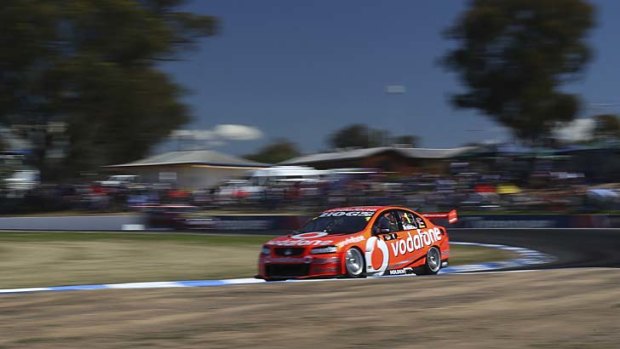 Still the leader: Jamie Whincup speeds around the Winton Motor Raceway yesterday on his way to victory.