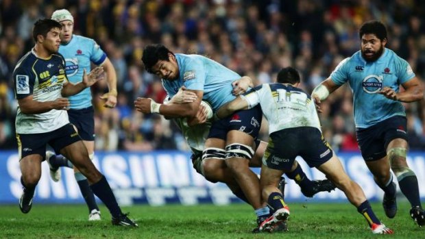 Man mountain: Will Skelton proves a handful for the Brumbies defence.