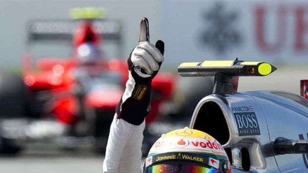 McLaren Mercedes driver Lewis Hamilton is seventh driver to win a grand prix this season.