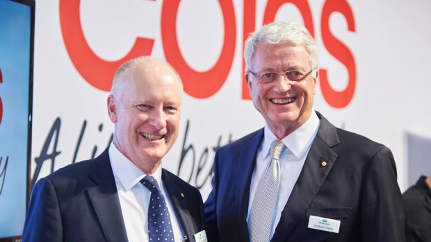Michael Chaney (right) will hand over to Richard Goyder (left) as Woodside chairman.
