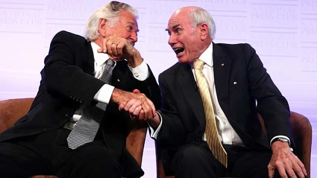 Mr Hawke and Mr Howard share a laugh.