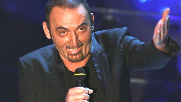 Collapsed on stage ... 60-year-old Italian singer Giuseppe Mango.