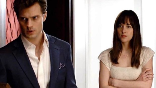 Dakota Johnson and Jamie Dornan in the movie adaptation of <i>Fifty Shades of Grey</i>.