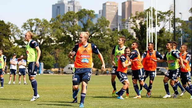 Training day: Melbourne Victory players go through their paces on Thursday.