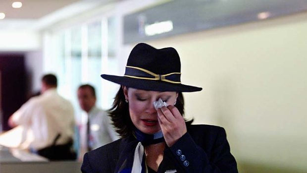The end ... a tearful Ansett employee during the final days of the airline.