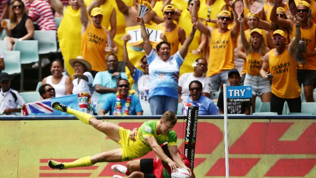 Three-try hero: Cameron Clark touches down for Australia during the Sydney Sevens.