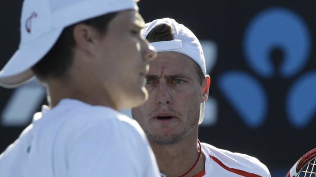 Two of us: Peter Luczak (left) with Lleyton Hewitt.
