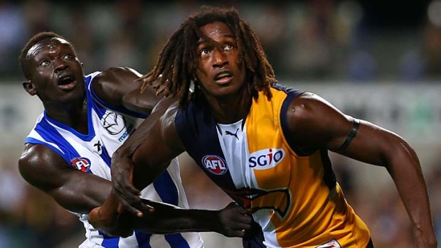 Magic man: West Coast star Nic Naitanui grapples with Sudanese sensation Majak Daw. Naitanui would be a perfect fit for the Giants, according to coach Kevin Sheedy.