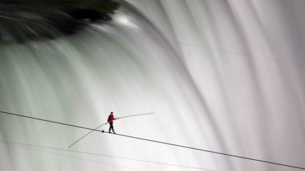 It's a walkover for Nik Wallenda, as he completes the first tightrope crossing over the mist-fogged brink of Niagara Falls.