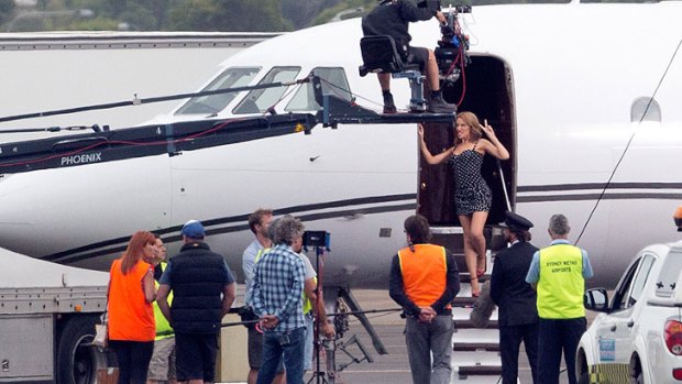 Kylie Minogue filming a new promotional video for her upcoming appearance on Channel Nine’s 'The Voice' at Bankstown airport.