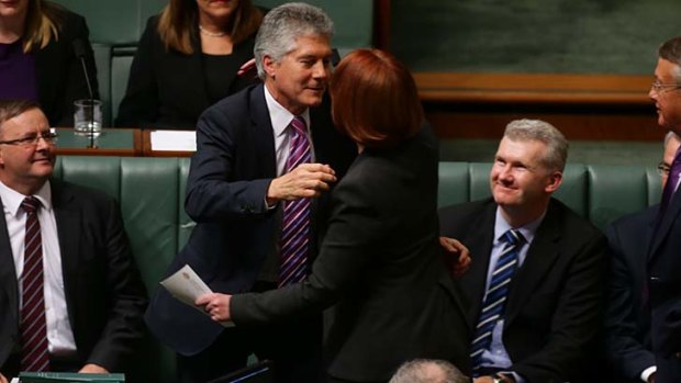 Kiss goodbye: Stephen Smith and former prime minister Julia GIllard.