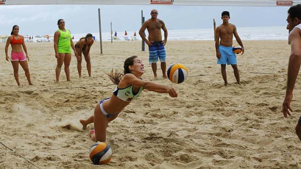 Volleyball players on the beach in Recife.