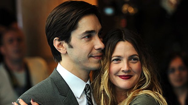Awkward ... On-again off-again couple Justin Long and Drew Barrymore walk the red carpet.