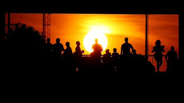 Darwin support: Fans watch the action during the round 14 match between the Eels and the Titans at TIO Stadium. 