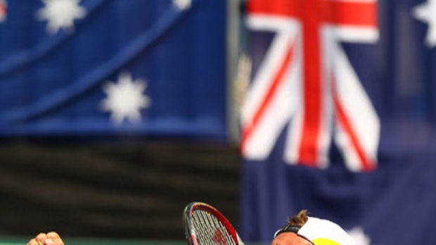 Lleyton Hewitt celebrates his victory over Belgium's Ruben Bemelmans in their Davis Cup clash in Cairns.