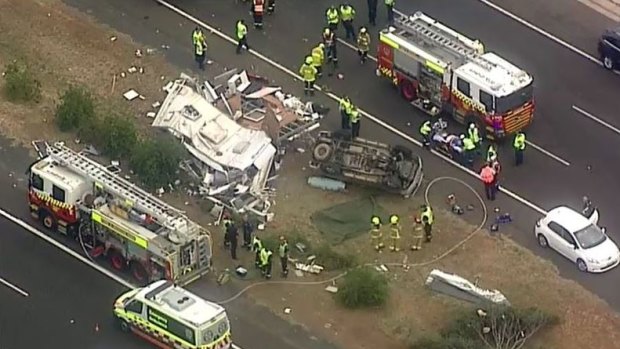 Two people are in a critical condition after a four-wheel-drive towing a caravan overturned on the M5 at Woodbine.