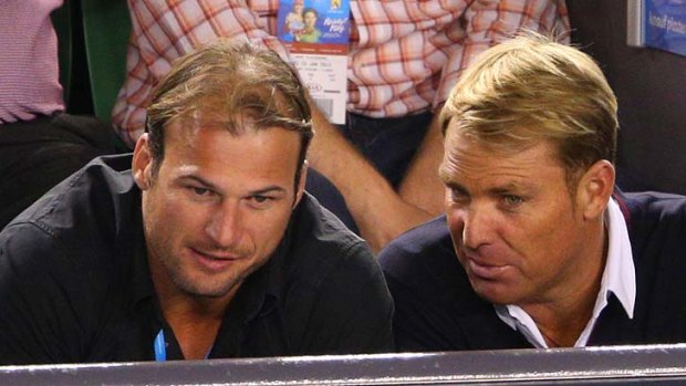 Shane Warne with friend and former St Kilda footballer Aaron Hamill at the Australian Open.
