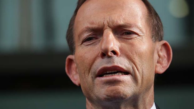 Tony Abbott: accused of physically intimidating a woman.