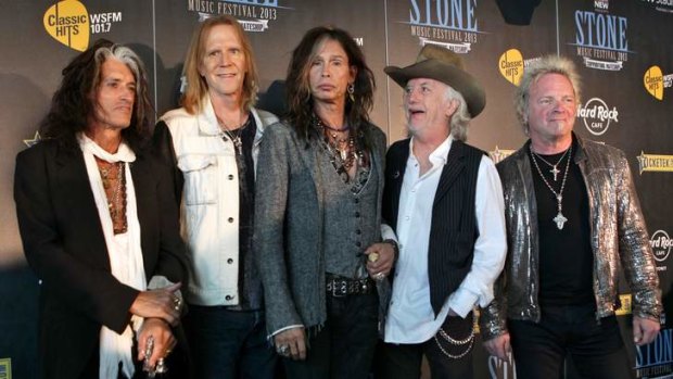 Don't smoke and ride ... Steven Tyler (centre) with his band Aerosmith