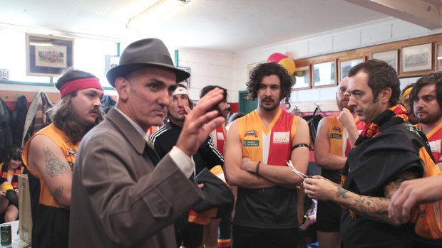 In tune: Singer Paul Kelly talks to the Espy Rockdogs players last year.