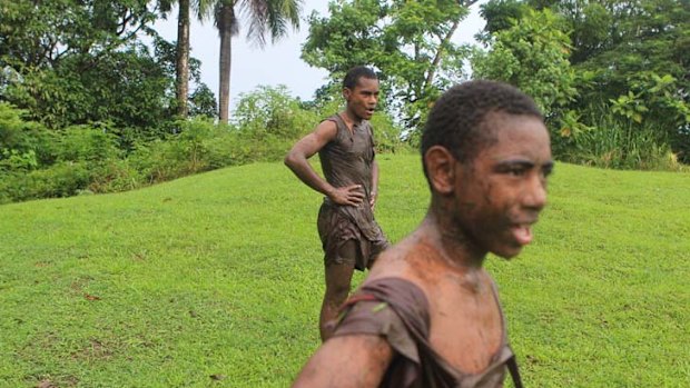 "We've arrived" ... boys practice on vacant land.