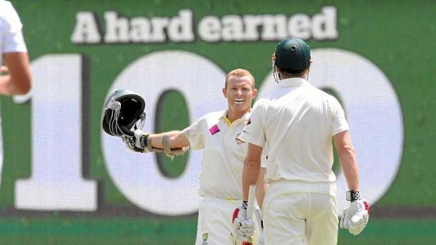 Backing up: Chris Rogers celebrates his second century of the match.