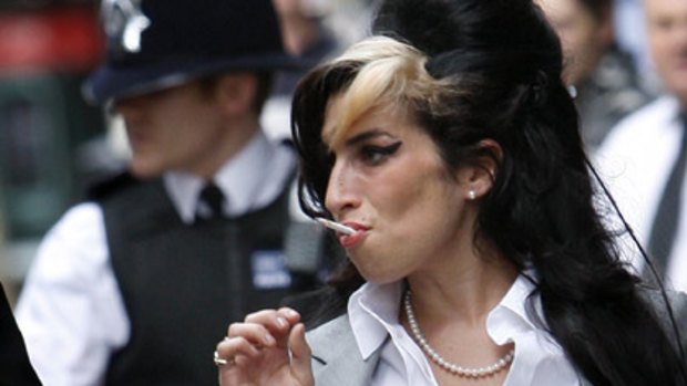 Cleared .. Amy Winehouse on her way into court.